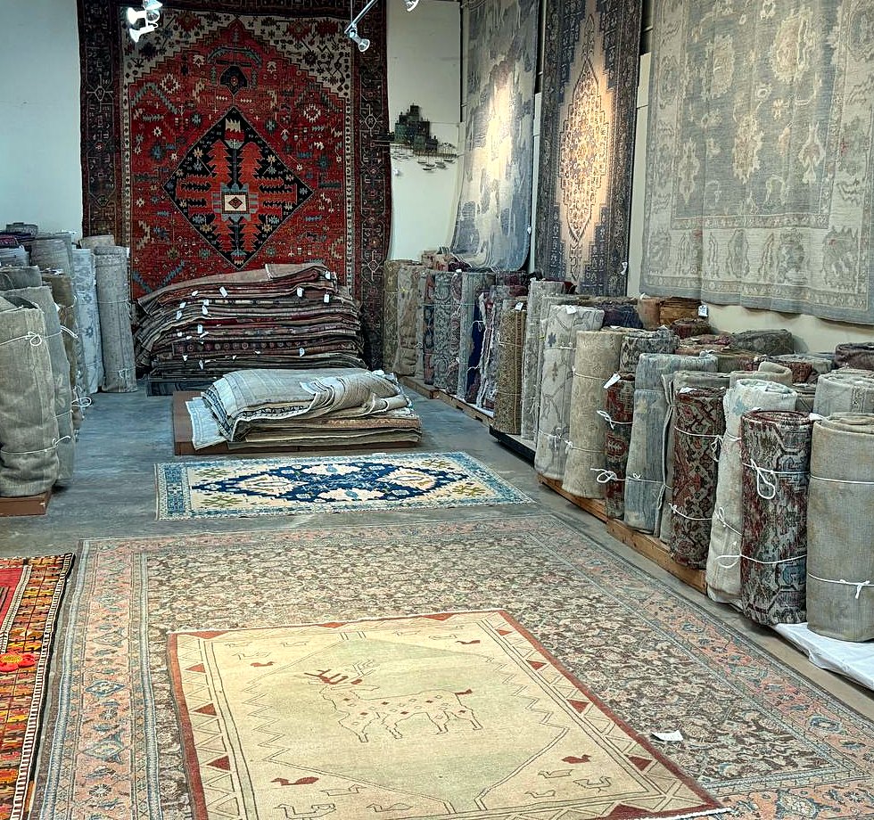 An antique Persian rug in the A R T Rugs gallery